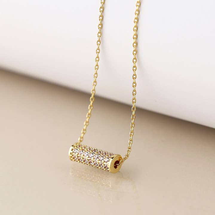 Collana con cilindro di cristallo dorato per la vendita all'ingrosso da parte di Peace Of Mind