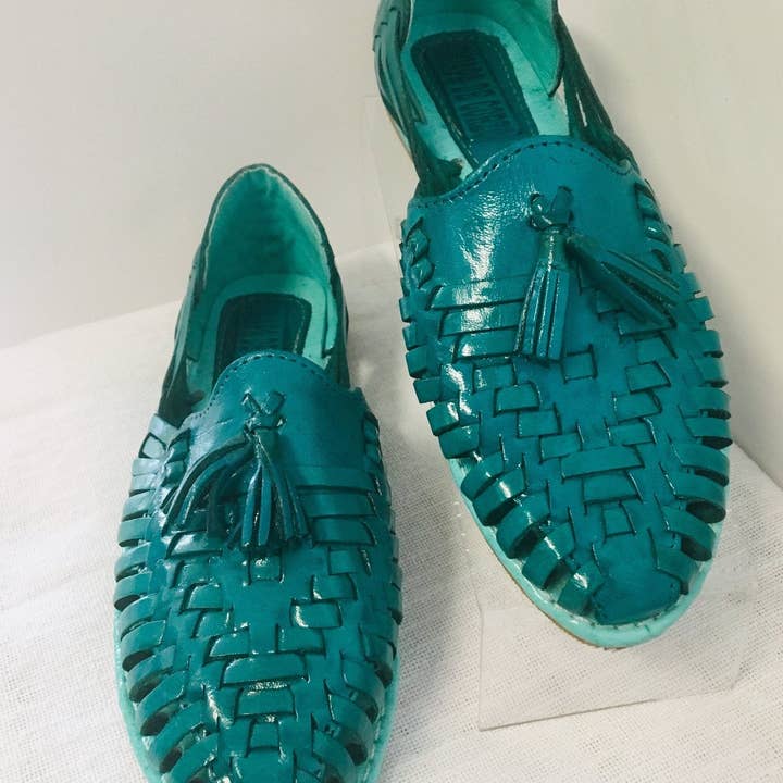 Mexican Handmade Leather Sandals Turquoise with tassels and other Purchase Wholesale espositore make up. Free Returns & Net 60 Terms on Faire trending on Faire.