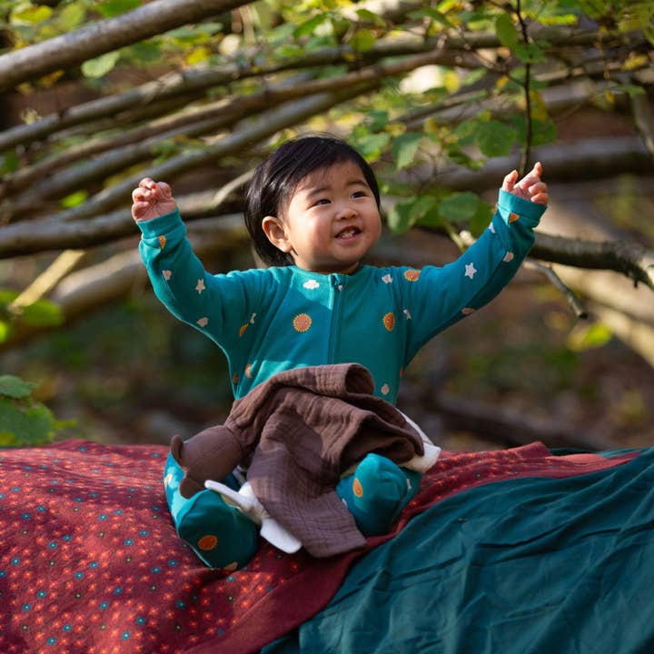 Turquoise Skies Zip Organic Babygrow for wholesale on Faire0
