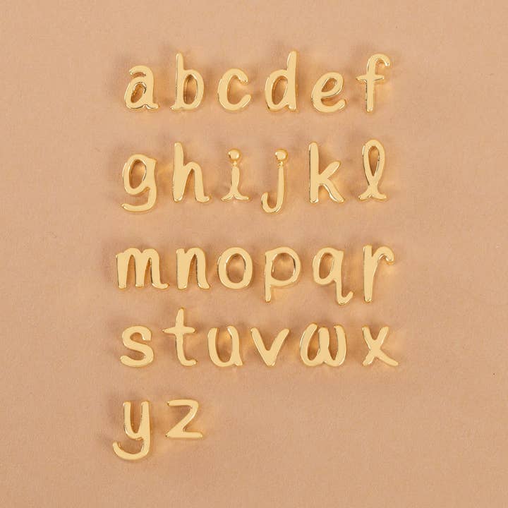 Ciondoli in oro con lettere minuscole per la vendita all'ingrosso da parte di Origami Owl