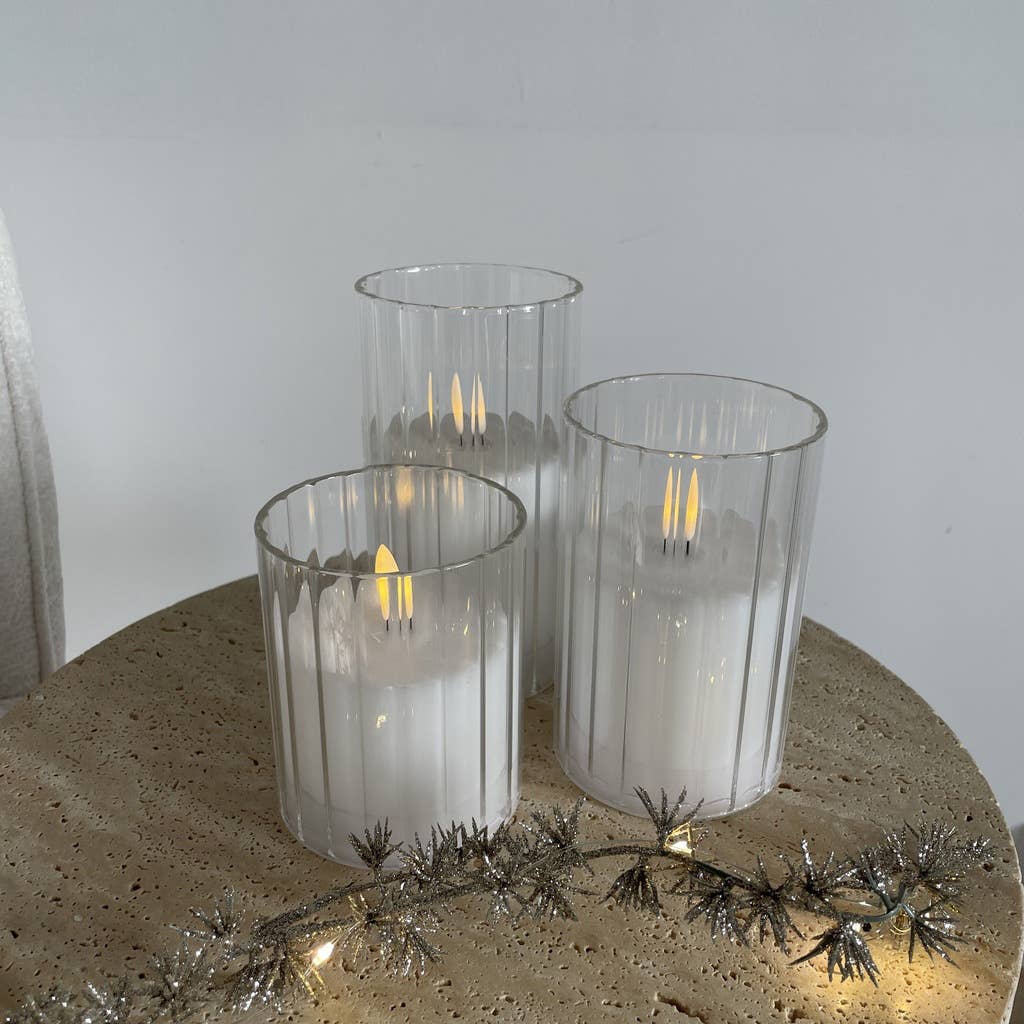 3 LED candles in flat-sided white glasses - remote control (battery operated) for wholesale on Faire2