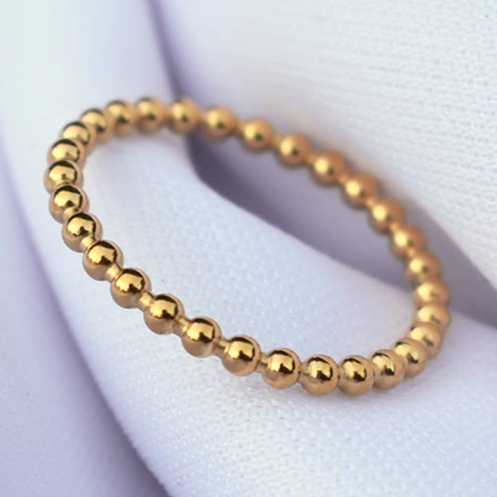 Anello impilatore con perline per la vendita all'ingrosso da parte di TNT Goods