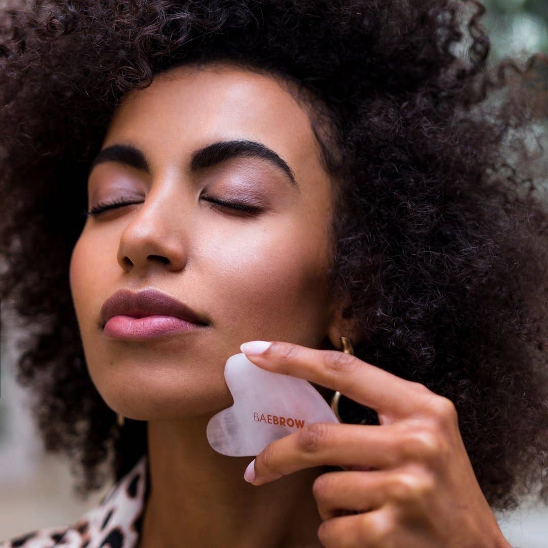 Pink Guasha Facial Massage Tool for wholesale on Faire2