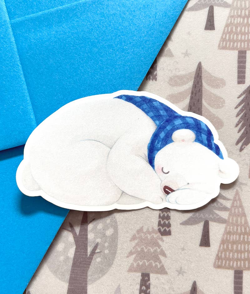 Sleepy polar bear | Transparent matte vinyl sticker for wholesale by Aiko Graven