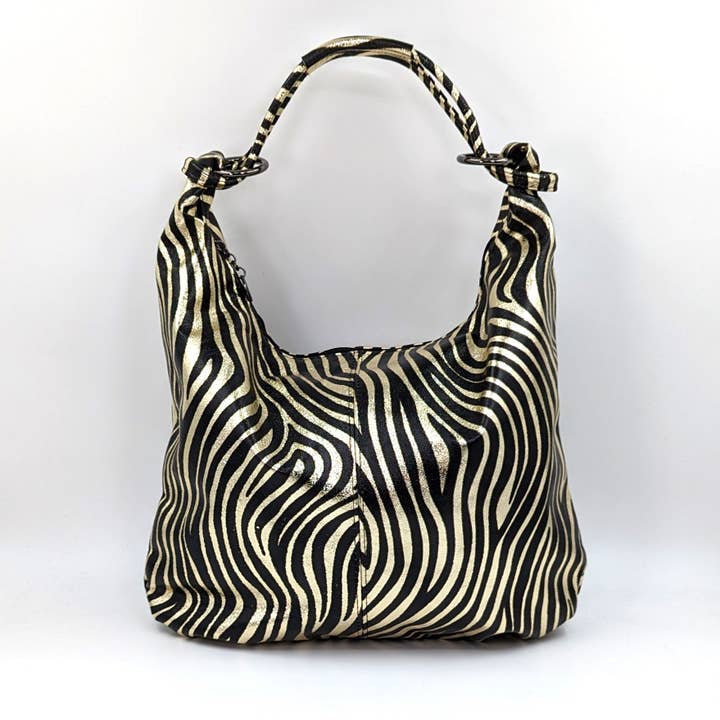 Bolsa de mão elegante em pele metálica relaxada com estampado de tigre e fecho de correr. por atacado de Tempest Designs