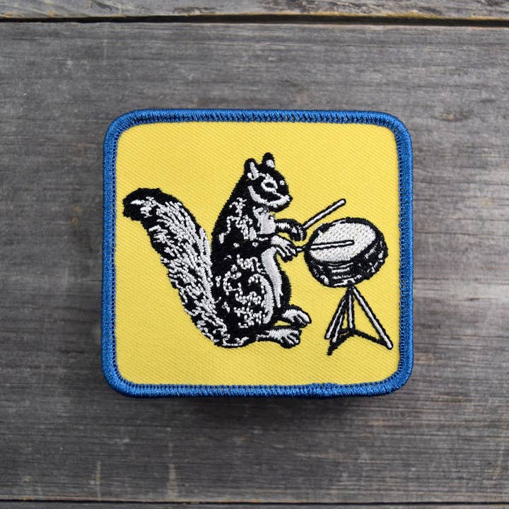 Ferdinand Drumming Squirrel Embroidered Patch for wholesale by Quiet Tide Goods
