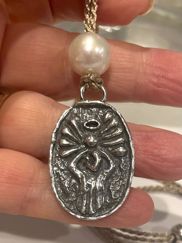 Artisan Sculpted Angel on Mermaid Rope for wholesale by Lily Chartier / Mermaid Rope