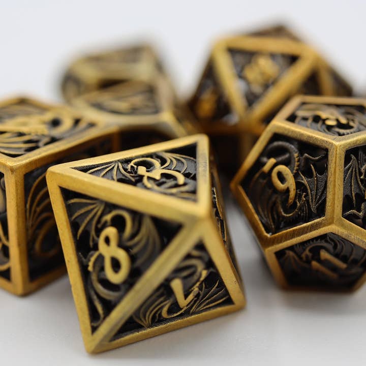 Dragon Essence: Gold - Hollow Metal RPG Dice Set for wholesale by Foam Brain Games