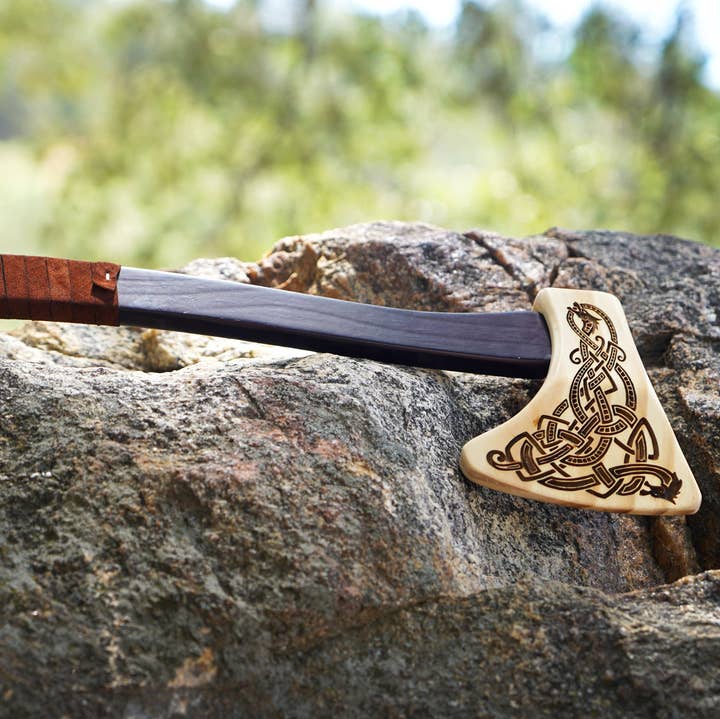 Wooden Play Axe with Norse Motif Engraving and Leather Wrap for wholesale by Backwoods Provisions