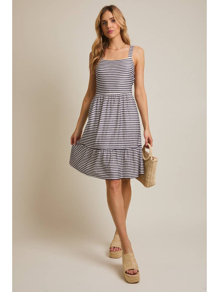 STRAP SIDE POCKET TIREDED STRIPE DRESS for wholesale on Faire