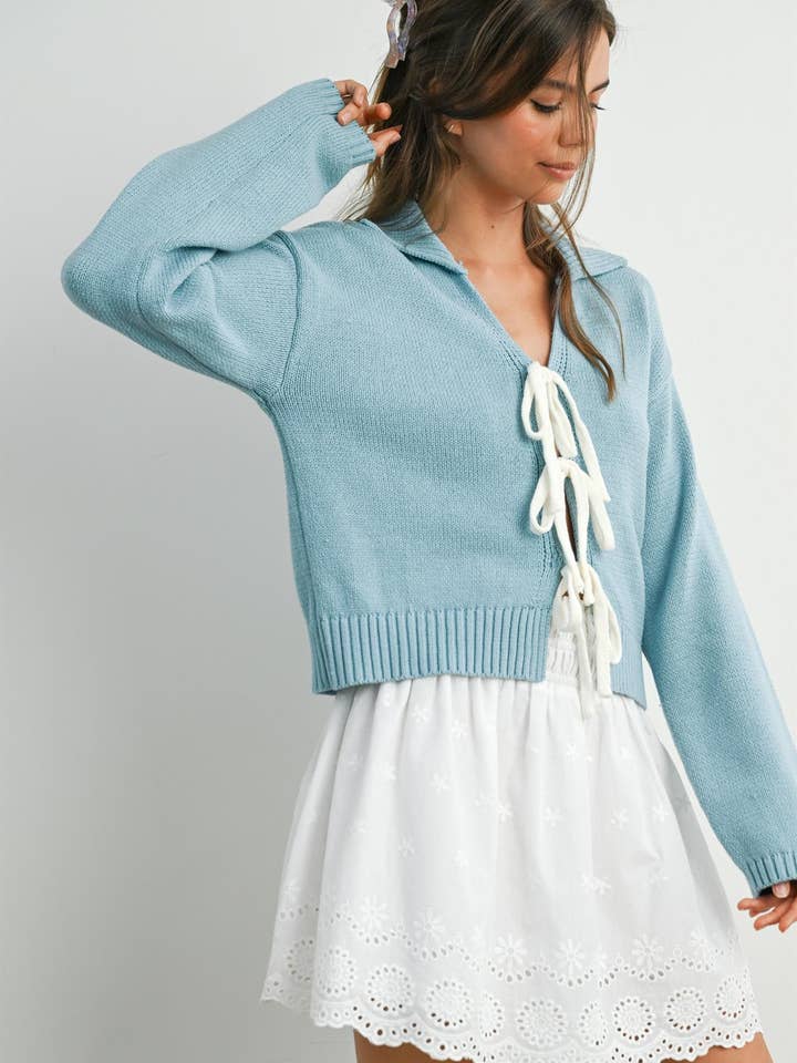 PL9909 - CÁRDIGAN DE PUNTO CON MANGAS LARGAS, ESCOTE EN V, CUELLO CON LAZO. para venta al por mayor de Peace Love Line