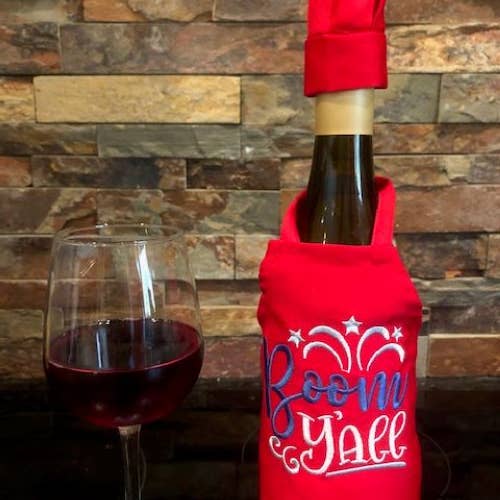 Wine Bottle Apron- Boom Y'all 4th of July for wholesale by All Aboard Party Headquarters