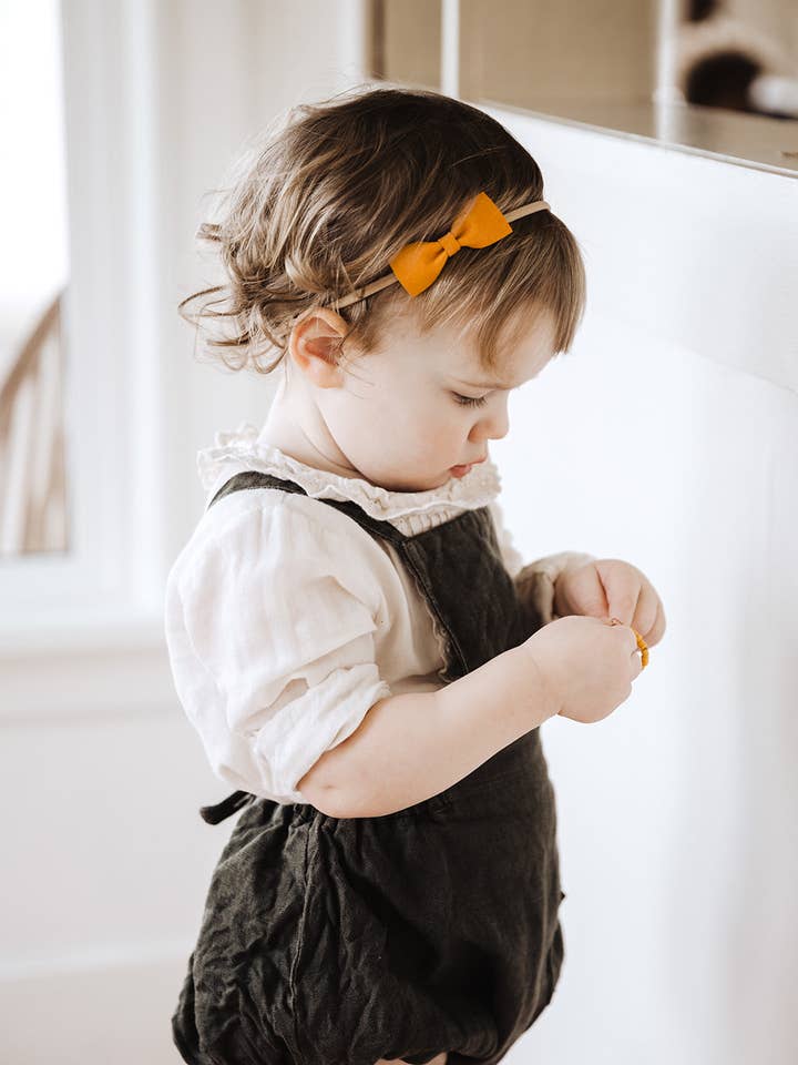 Holly for wholesale by Lauren Darling Co.