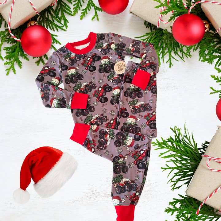 Christmas 2025 Pajamas - Holiday Monster Truck Santa for wholesale by Rufflеѕ & Bоwtіеѕ - Affordable Boys & Girls Clothing