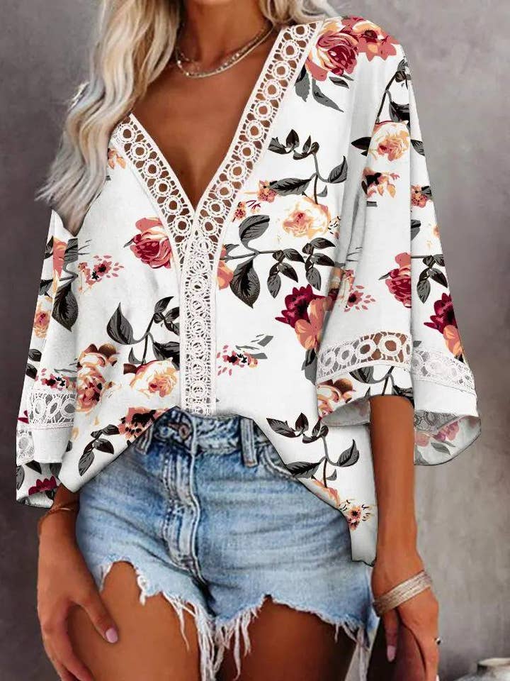 blusa com estampa floral manga sino renda com decote em v por atacado de Queen Fashion