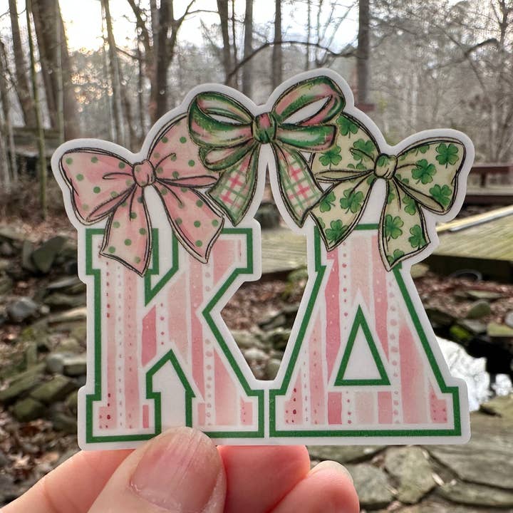 Sticker | KD | Kappa Delta Green Pink Bows | Waterproof Vinyl Sticker | White | Clear | Permanent | Removable | Window Cling | Glitter | Holographic for wholesale by My Vinyl Cut