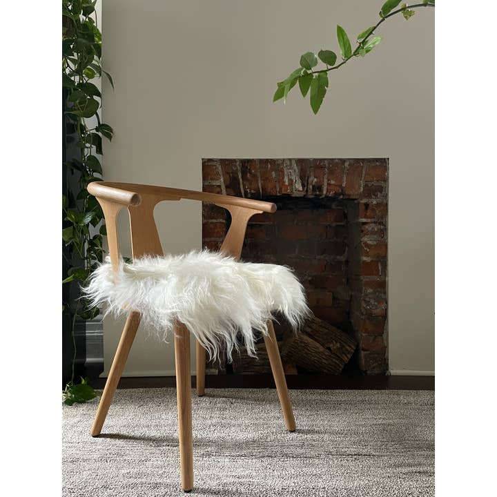 Black Sheep (White Light) - Wholesale Chair Cushion - White Icelandic Sheepskin Chair Pad