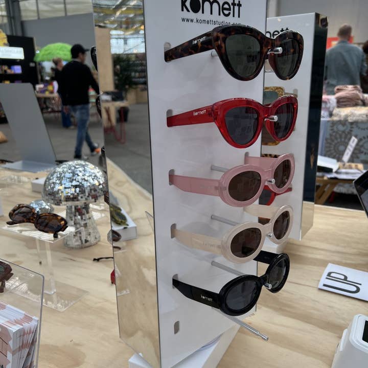 Display 12 sunglasses for wholesale by Komett Studios