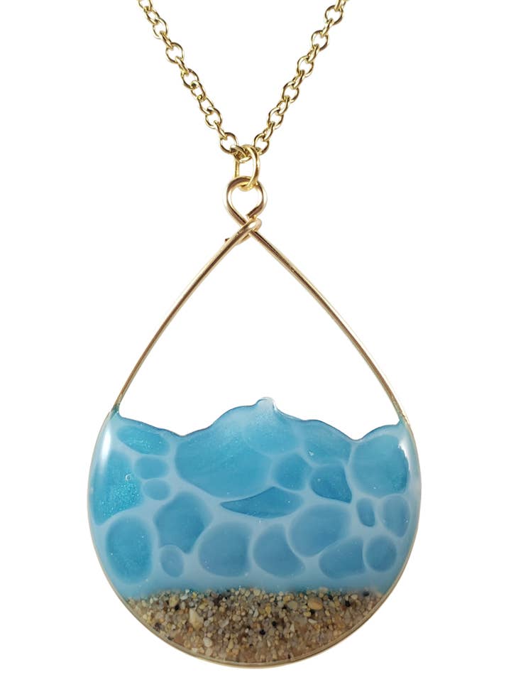 Blue seafoam water and sand necklace in yellow gold for wholesale by Skinny Pig Designs
