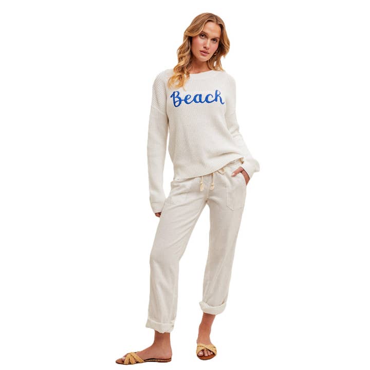 Vang de Kustbries in een Strandklare Ronde Hals. voor wholesale door Apolline