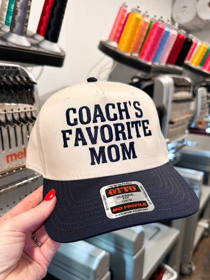Coach’s Favorite Mom | Embroidered OTTO Trucker Hat for wholesale by D&E Threads