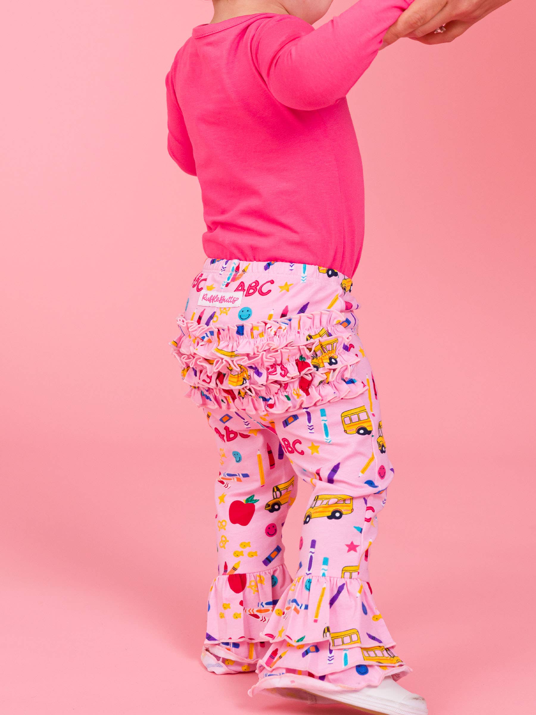 Baby Girls Pink School House Ruffle Flare Pants
for wholesale on Faire