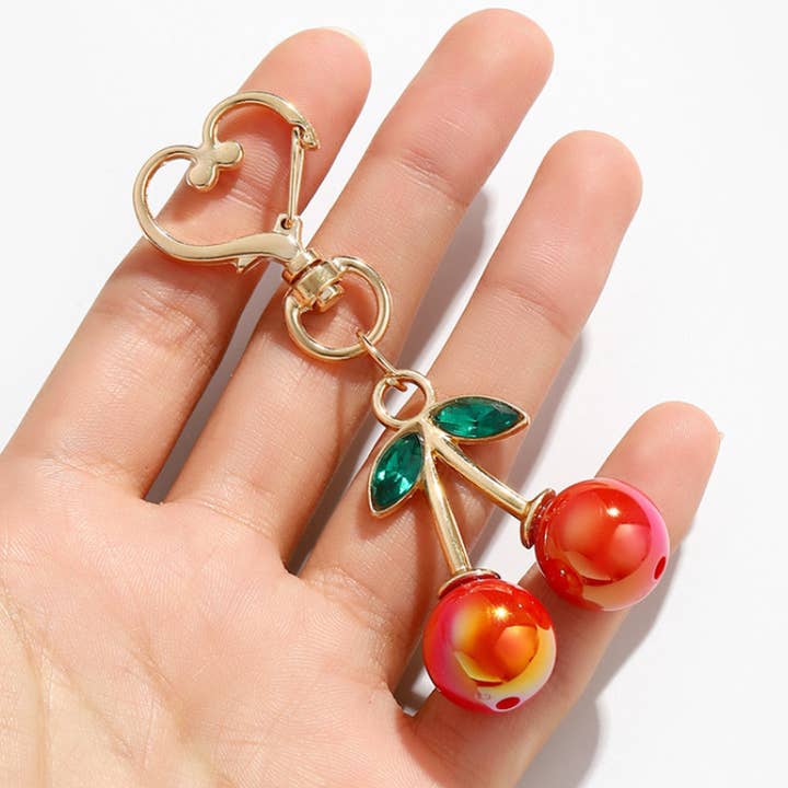 Ornaments-Resin cherry heart hook keychain ball charm for wholesale by Eagle Crest Industries Inc.