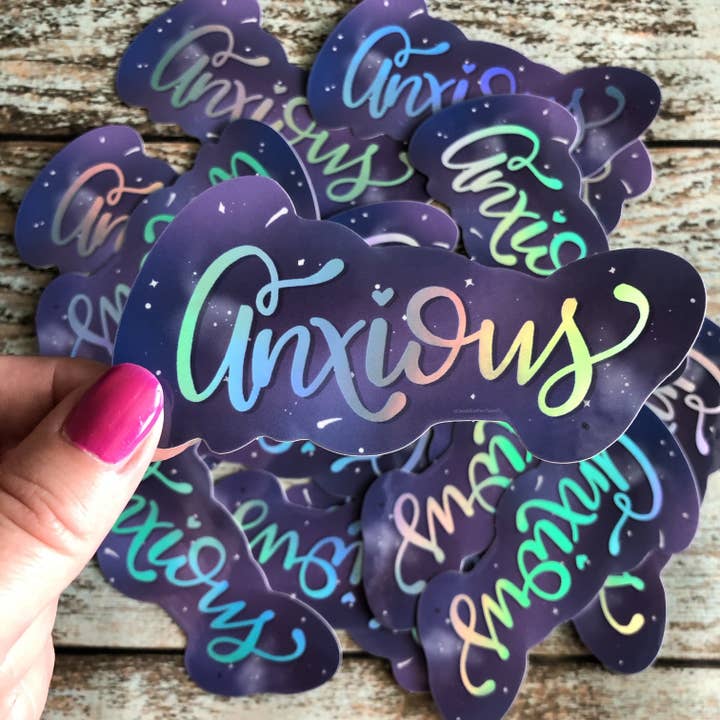 Holographic Anxiety in space Vinyl sticker for wholesale by Cheek and Pen Paper Co