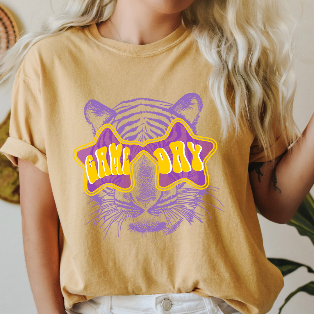 Pink House On River Road - Wholesale Screen Printed T-Shirt - Women's - Game Day Shade LSU Tigers Graphic Tee0