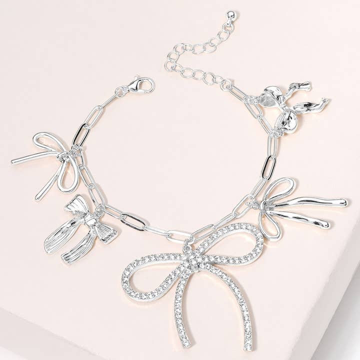 Sensibling Corp. - Wholesale Charm/Dangle Bracelet - Stone Paved Bow Metal Bow Charm Station Paperclip Bracelet