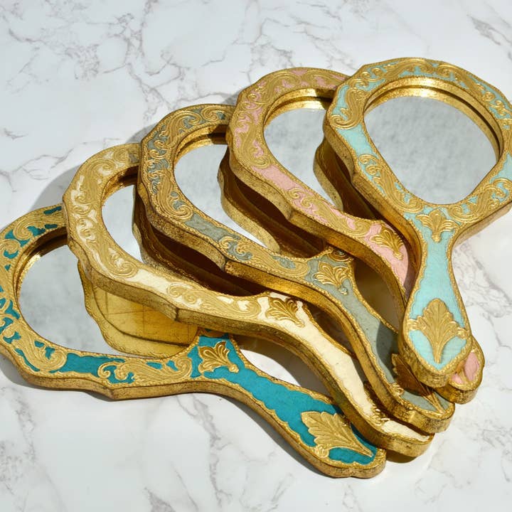 Florentine Wood Oval Hand Mirrorly and other Purchase Wholesale hand held mirror. Free Returns & Net 60 Terms on Faire trending on Faire.