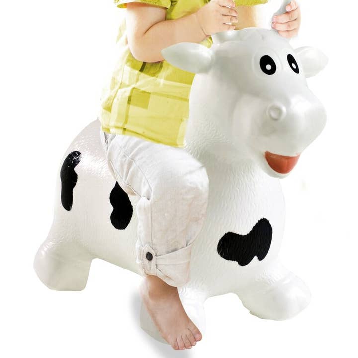 Vache sauteur blanche et noire avec pompe pour la vente par mhw24