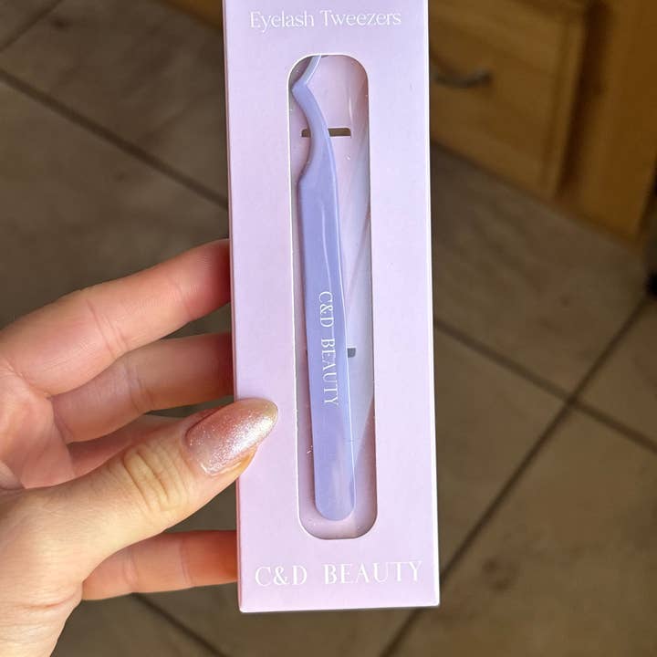 Luxe Glide Tweezers for wholesale by C & D Beauty LLC.