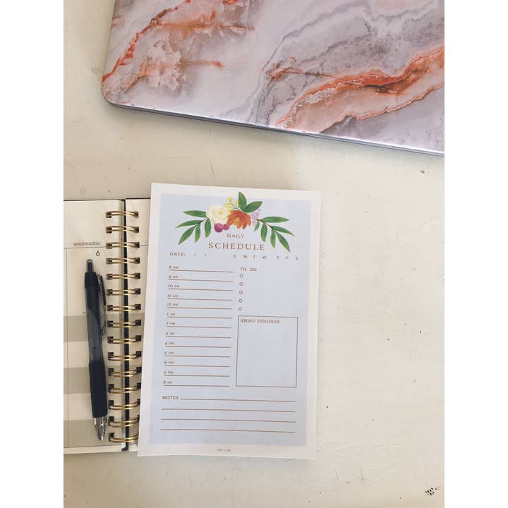 Blocco note di pianificazione giornaliera per la vendita all'ingrosso da parte di Joy + Company