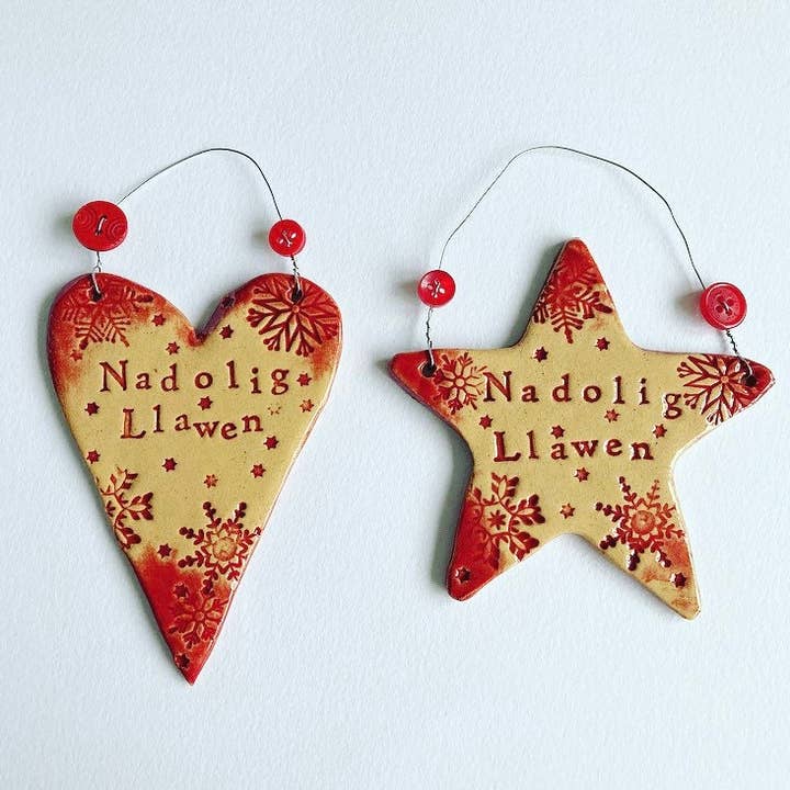 Nadolig Llawen Welsh Ceramic Heart/Star Decoration for wholesale by Love & Lovelier