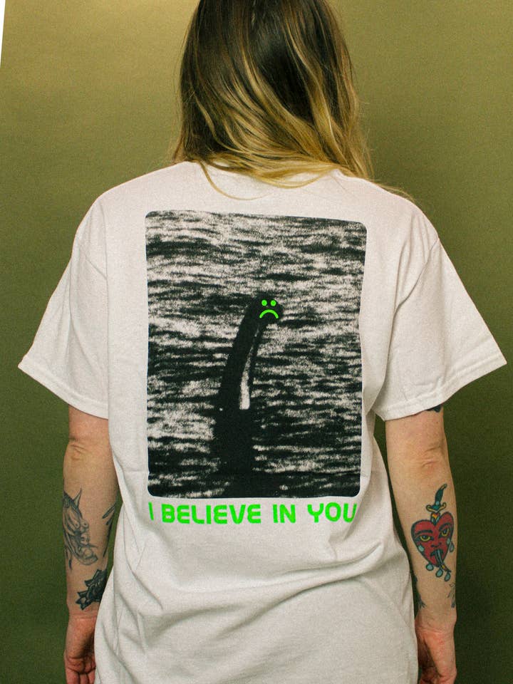 "Conspiracy Theories Nessie" T-Shirt by Family Store for wholesale by Family Store UK