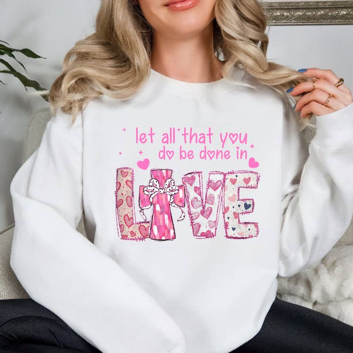 Let All That You Do Be Done In Valentines Day Sweatshirt for wholesale by Simply Spoken Apparel