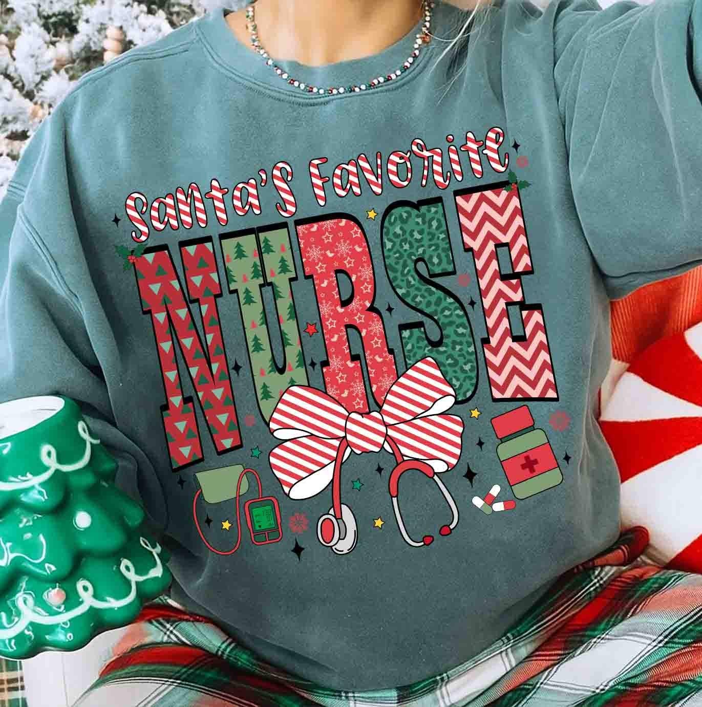 NVC Ecommerce LLC - Wholesale T-Shirt (Graphic) - Women's - Santa’s Favorite Nurse Shirt, Christmas Nurse Sweater1