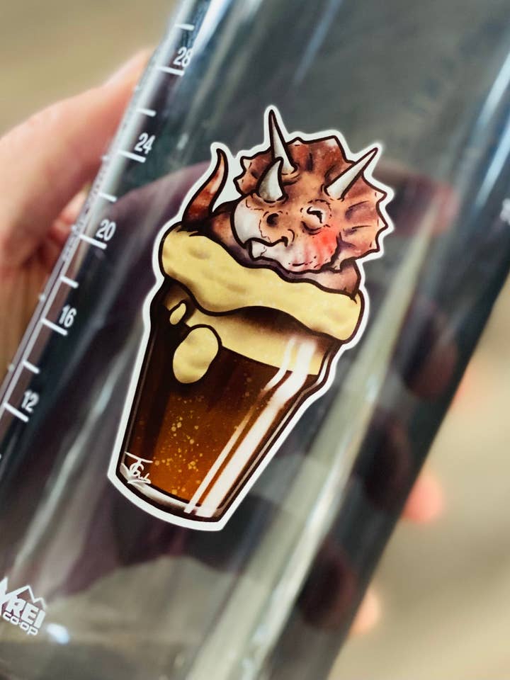 Triceratops In Beer Sticker! for wholesale by Guerdrum Art