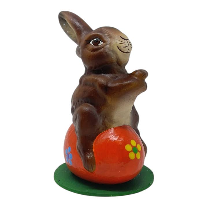 Pinnacle Peak Trading - Wholesale Decorative Figurine - Ino Schaller Easter Bunny on Orange Egg German Paper Mache