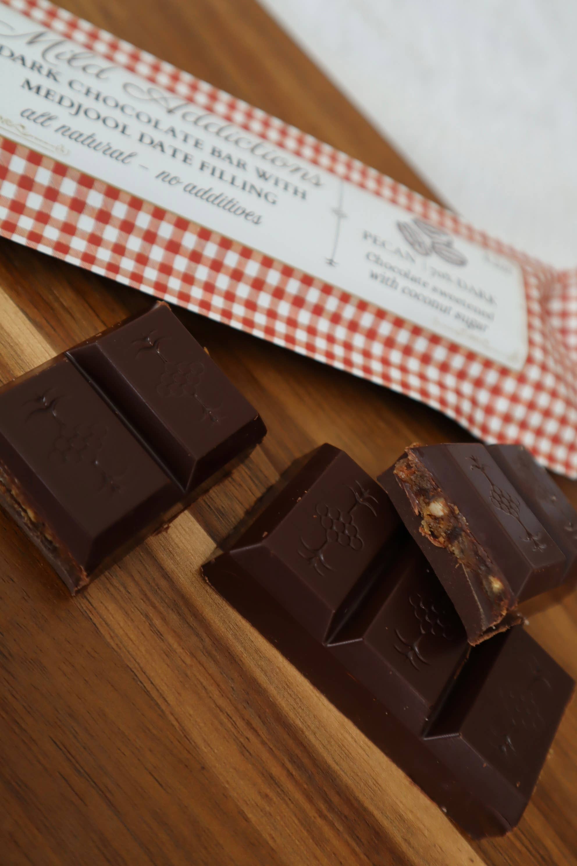 Mild Addictions – wholesale Chocolate bar – Dark Chocolate Bar with Pecan & Medjool Date Center — 4.2oz2