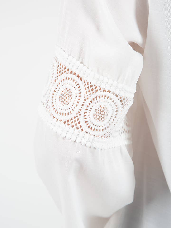 BIANCO Blusa con ricamo in vendita all'ingrosso su Faire4