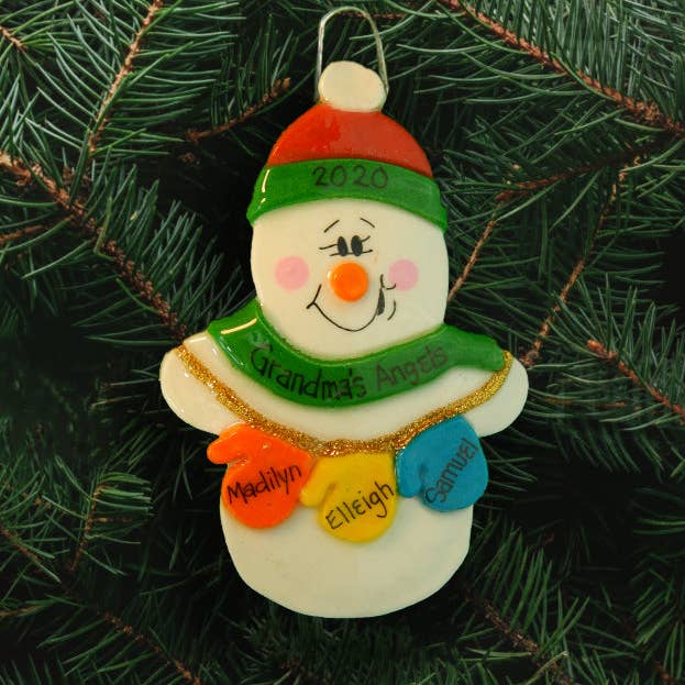 Décoration en forme de bonhomme de neige avec mitaines pour la vente par Dough Delights, Inc