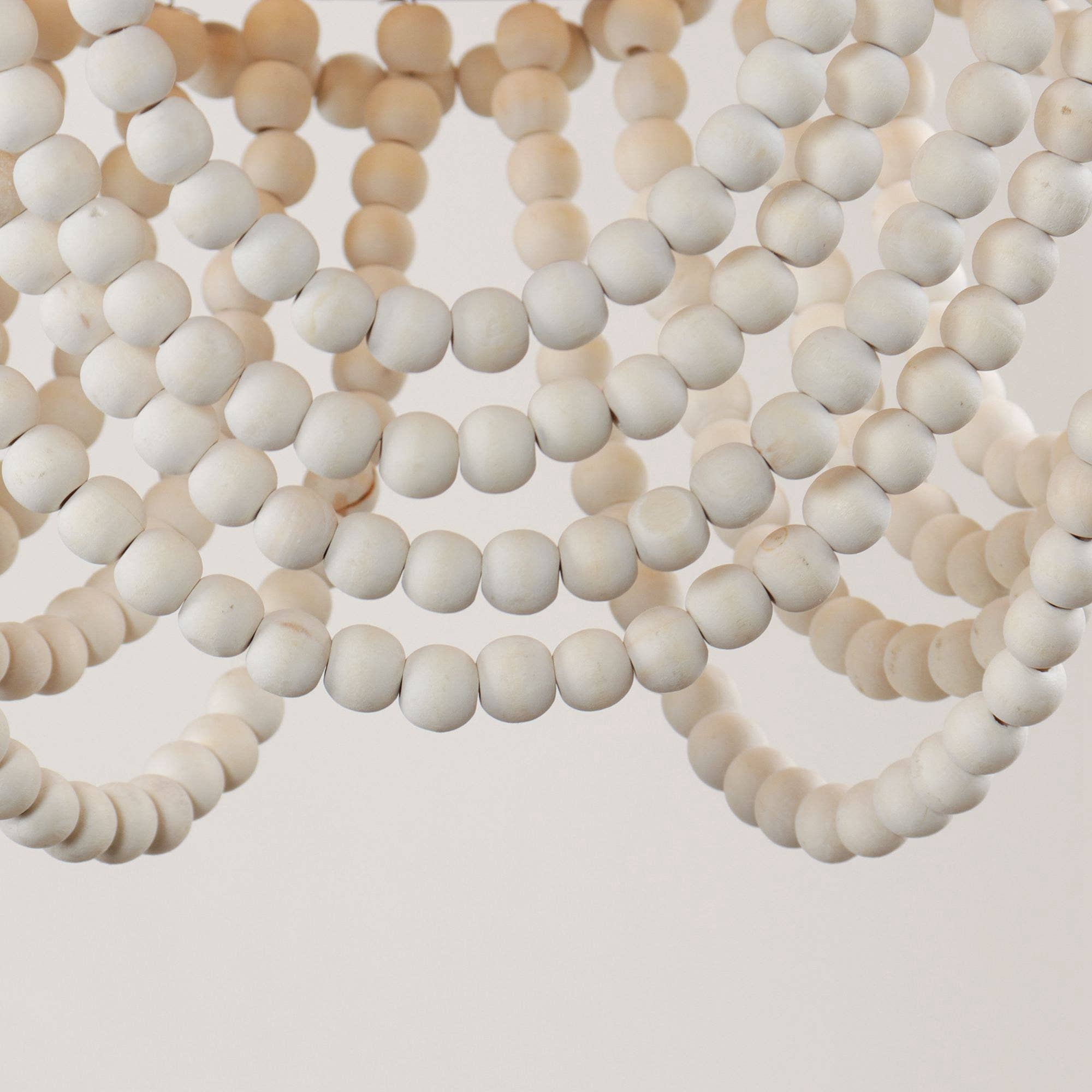 Off White Lusteria 20" Wood Bead 4-Light Tiered Coastal Chandelier for wholesale on Faire11