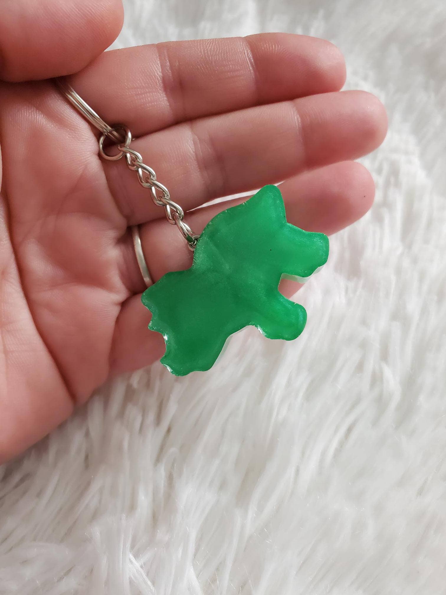 Tots And Tumblers Art - Venta al por mayor Llavero - Niños - Llavero de resina de dinosaurio, llavero tipo mochila15