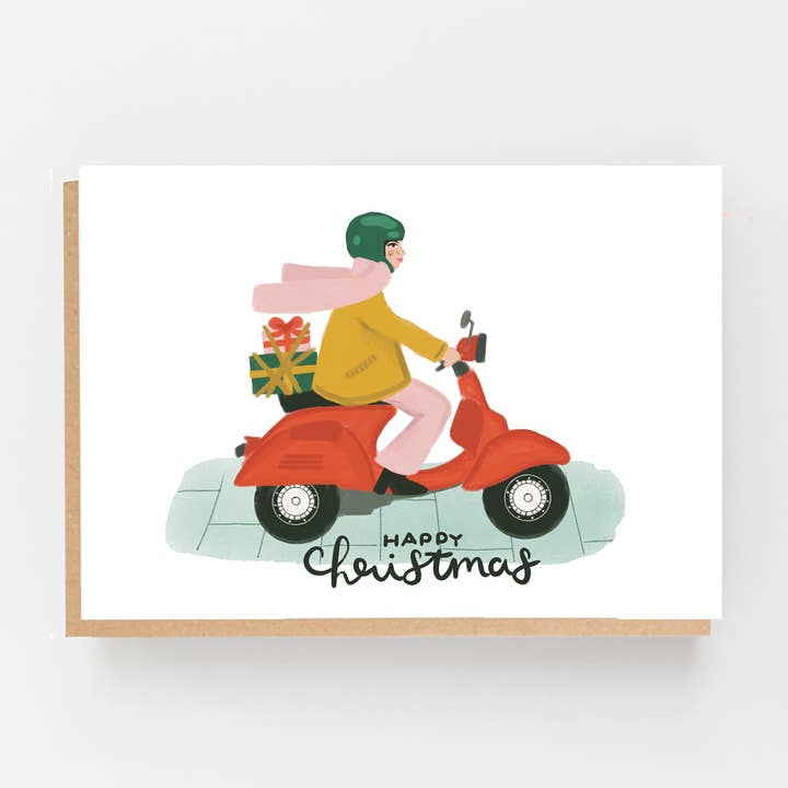 Glad jul - Christmas Moped Girl för wholesale av Lomond Paper Co