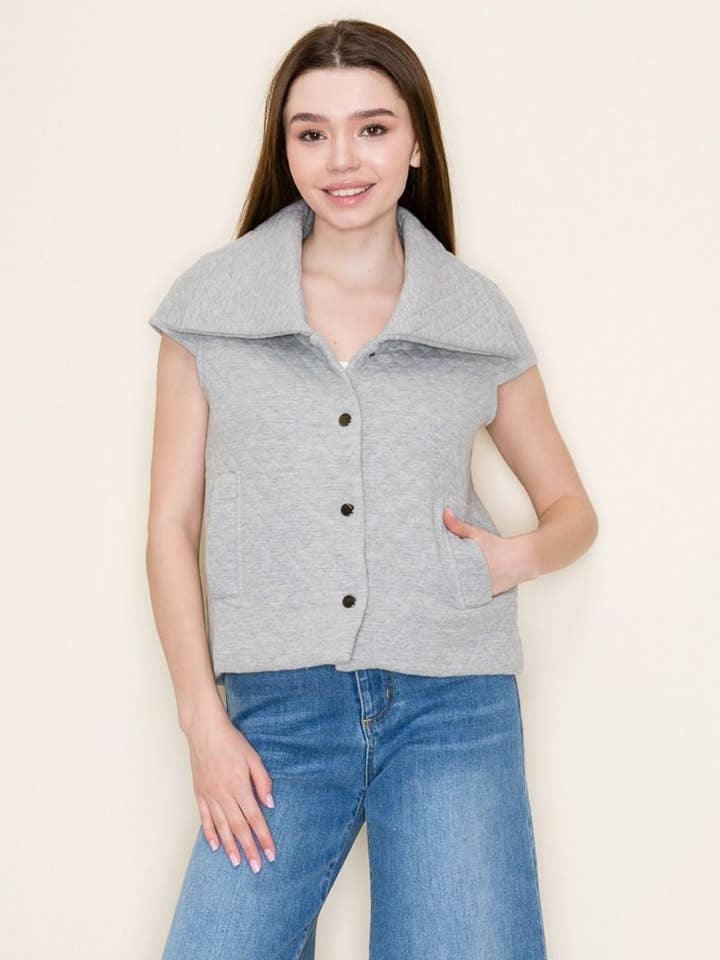 SLEEVELESS SOLID BUTTON DOWN VEST for wholesale by Stylish Wholesale