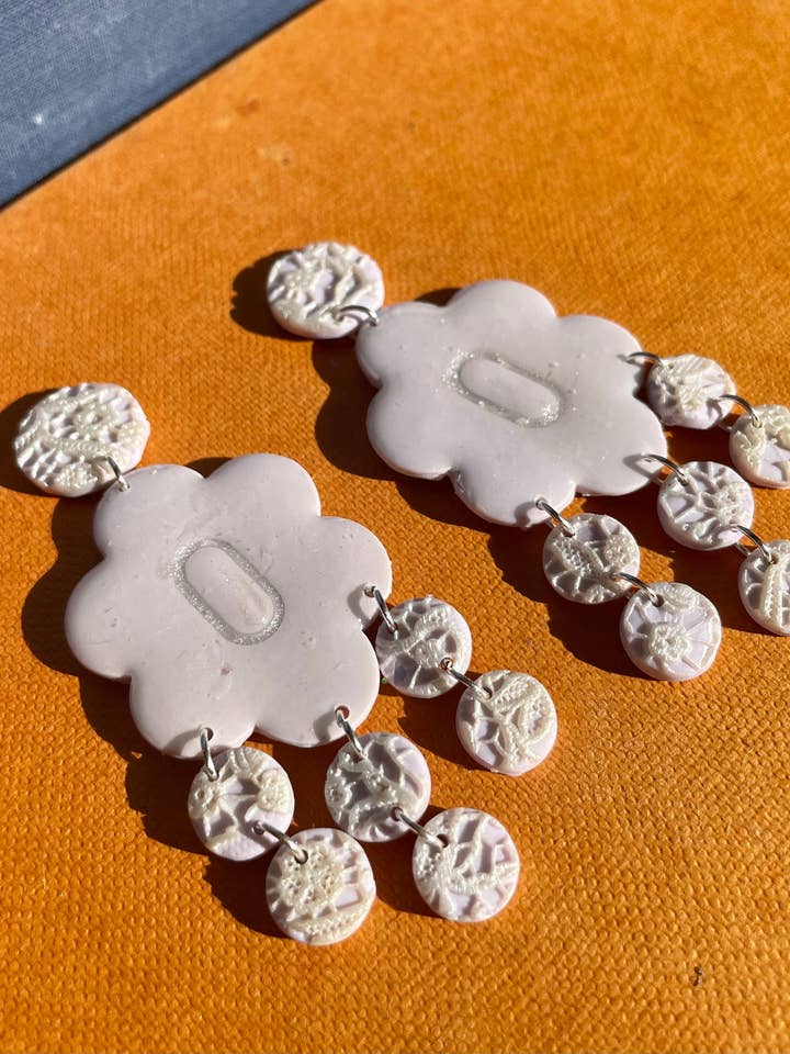 Purple Lacey dangle earrings for wholesale by She makes clay