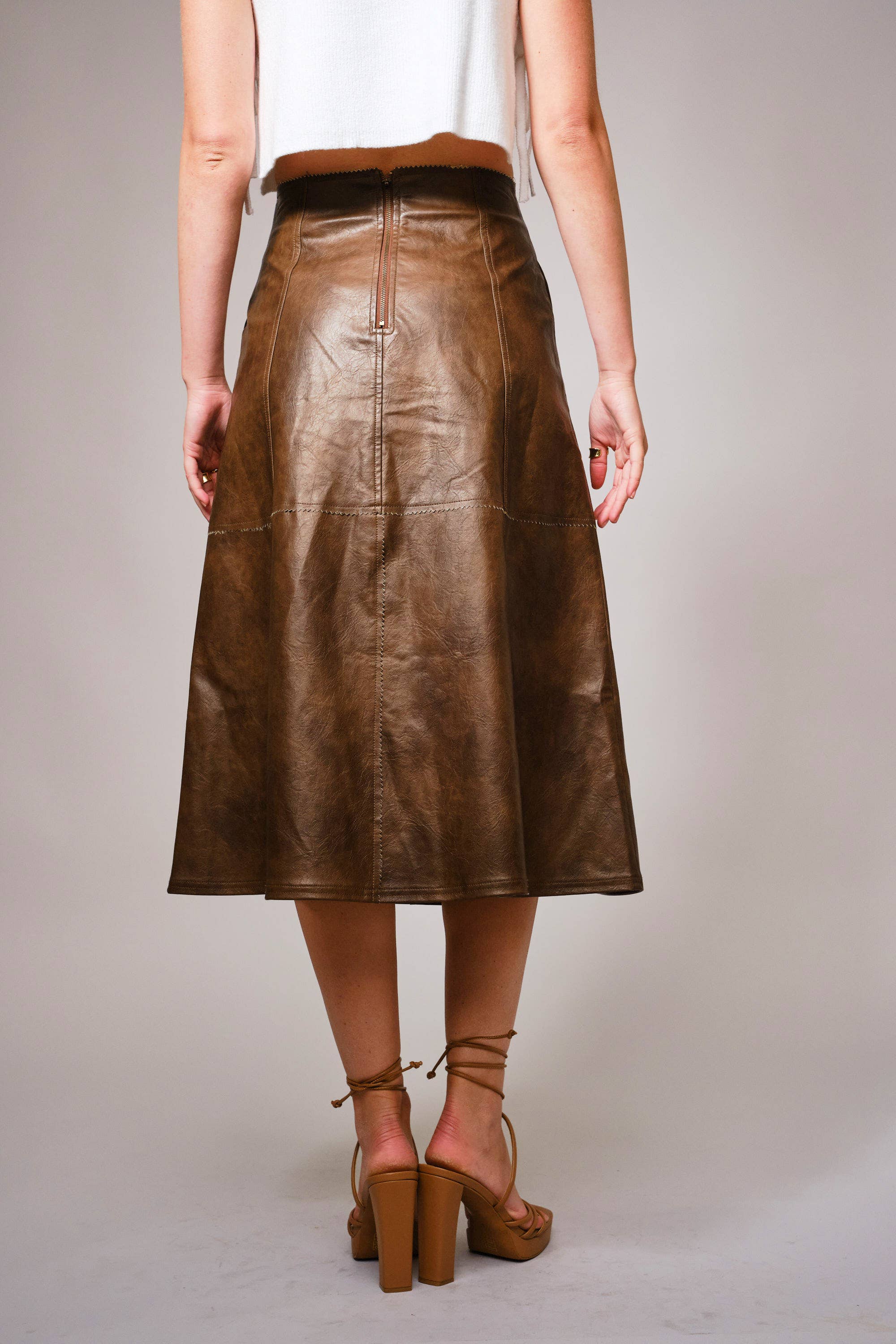 BROWN 37012S - Zigzag Seam Washed Faux Leather Midi Skirt for wholesale on Faire2