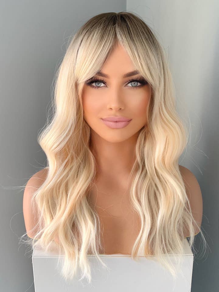 "Krista" - Wavy Blonde Wig with Bangs for wholesale by The Extension Room